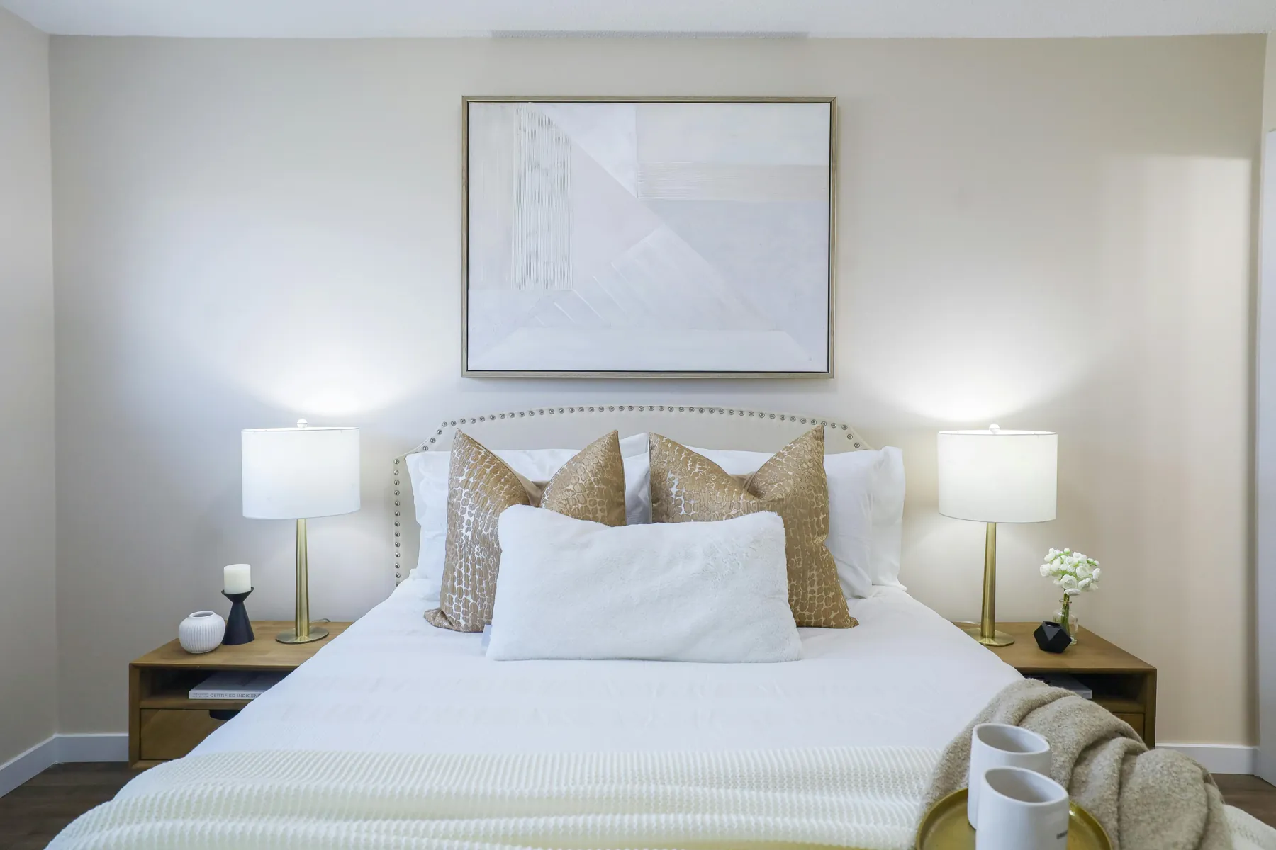 Illustrative clean bedroom with warm neutral tones