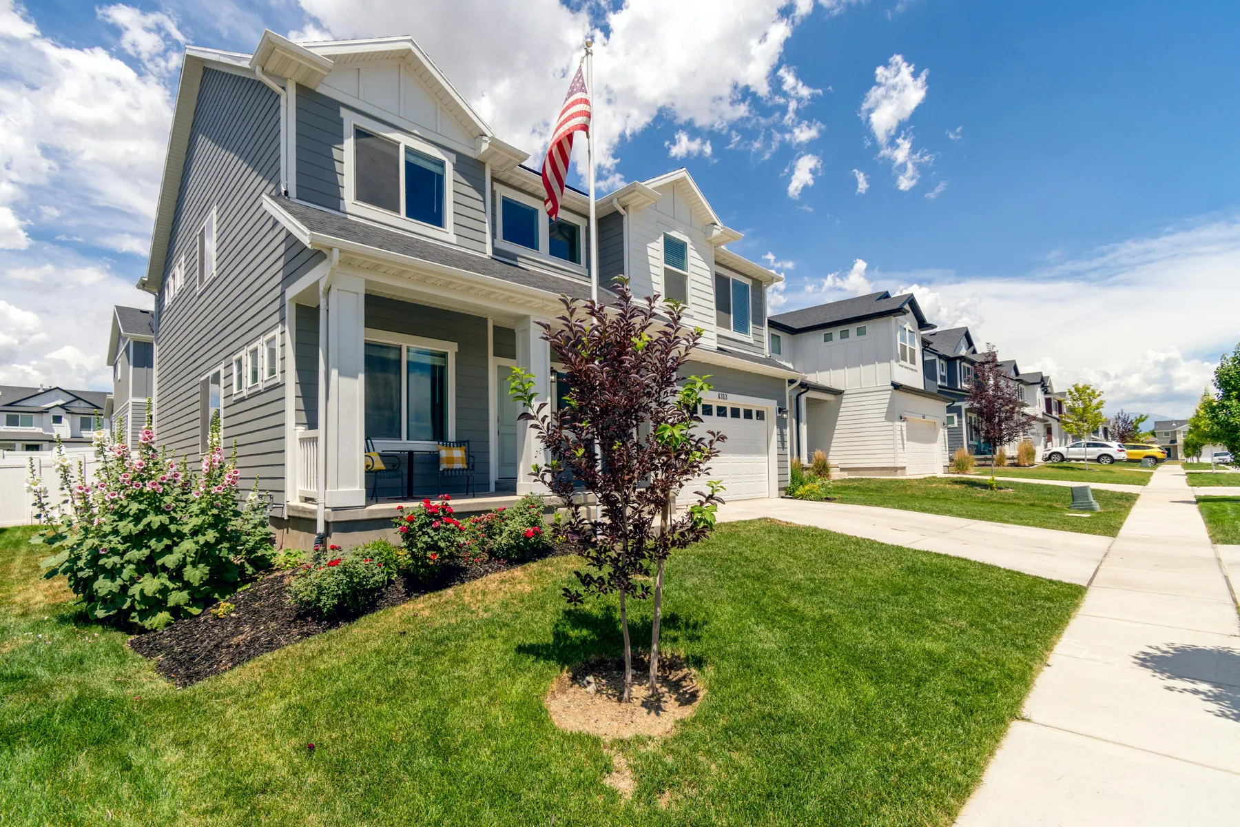 Illustrative residential home exterior representing the type of neighborhood feel used on the website